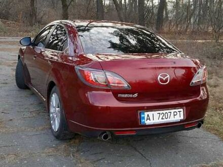Красный Мазда 6, объемом двигателя 2 л и пробегом 210 тыс. км за 7300 $, фото 1 на Automoto.ua