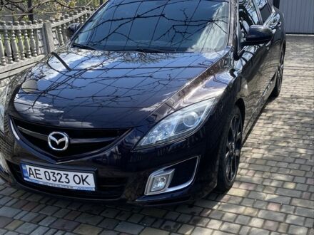 Красный Мазда 6, объемом двигателя 2.5 л и пробегом 244 тыс. км за 8600 $, фото 1 на Automoto.ua