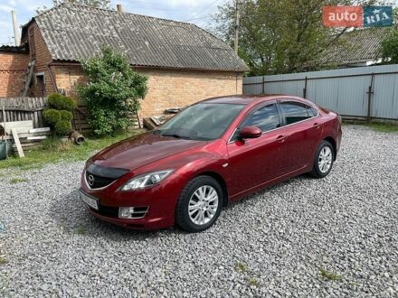 Красный Мазда 6, объемом двигателя 2 л и пробегом 232 тыс. км за 7800 $, фото 1 на Automoto.ua