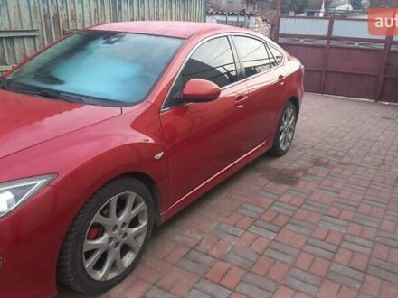 Красный Мазда 6, объемом двигателя 2 л и пробегом 227 тыс. км за 7500 $, фото 1 на Automoto.ua