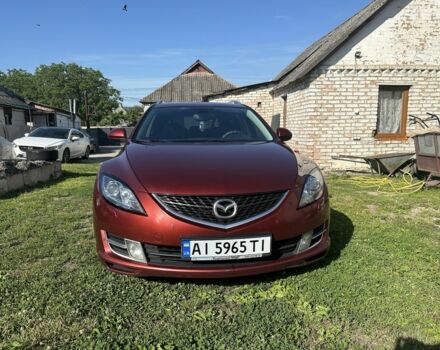 Красный Мазда 6, объемом двигателя 2 л и пробегом 276 тыс. км за 7695 $, фото 1 на Automoto.ua