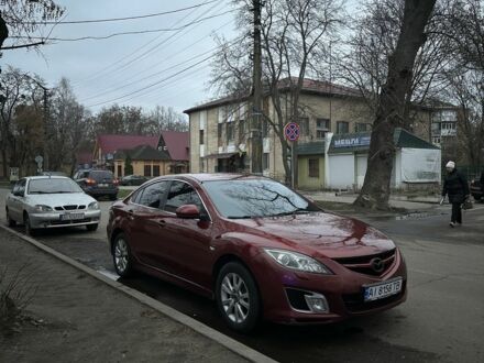 Красный Мазда 6, объемом двигателя 2.5 л и пробегом 295 тыс. км за 7000 $, фото 1 на Automoto.ua