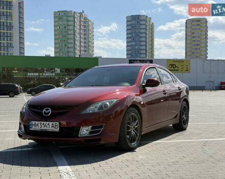 Красный Мазда 6, объемом двигателя 2 л и пробегом 235 тыс. км за 8300 $, фото 1 на Automoto.ua