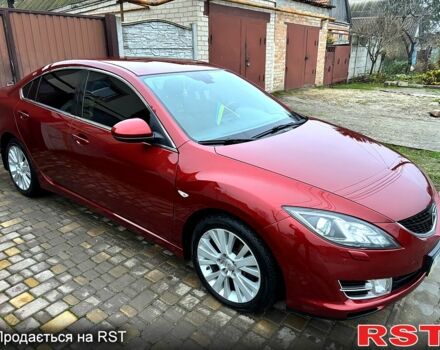 Красный Мазда 6, объемом двигателя 2 л и пробегом 185 тыс. км за 7700 $, фото 1 на Automoto.ua