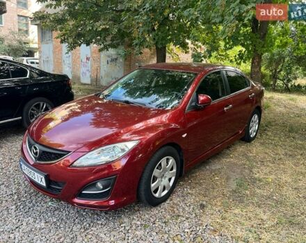 Красный Мазда 6, объемом двигателя 2 л и пробегом 210 тыс. км за 7800 $, фото 1 на Automoto.ua