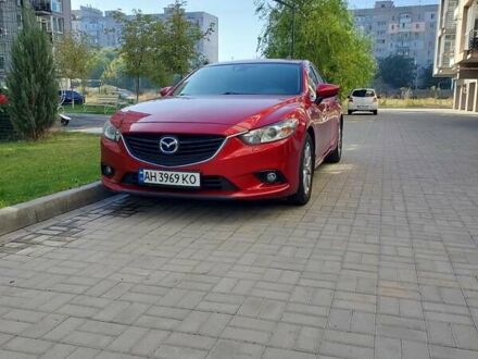 Красный Мазда 6, объемом двигателя 2 л и пробегом 100 тыс. км за 13500 $, фото 1 на Automoto.ua