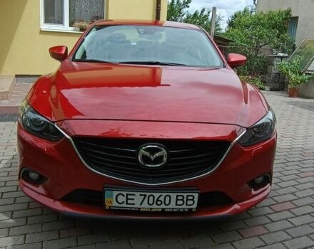 Красный Мазда 6, объемом двигателя 2 л и пробегом 112 тыс. км за 10850 $, фото 1 на Automoto.ua