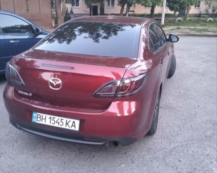 Красный Мазда 6, объемом двигателя 1.8 л и пробегом 260 тыс. км за 7100 $, фото 1 на Automoto.ua