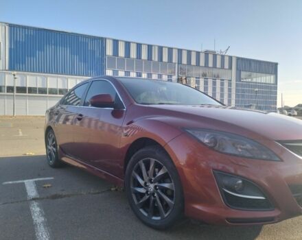 Красный Мазда 6, объемом двигателя 1 л и пробегом 260 тыс. км за 6744 $, фото 1 на Automoto.ua
