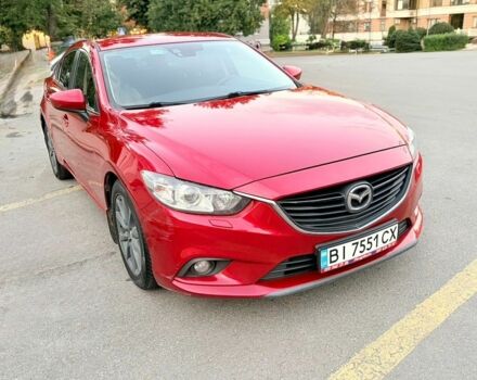 Красный Мазда 6, объемом двигателя 2 л и пробегом 176 тыс. км за 11000 $, фото 1 на Automoto.ua