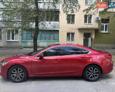 Красный Мазда 6, объемом двигателя 2.49 л и пробегом 165 тыс. км за 10750 $, фото 1 на Automoto.ua