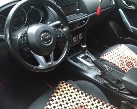 Красный Мазда 6, объемом двигателя 2 л и пробегом 114 тыс. км за 11203 $, фото 1 на Automoto.ua