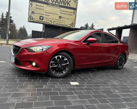 Красный Мазда 6, объемом двигателя 2.49 л и пробегом 175 тыс. км за 12590 $, фото 1 на Automoto.ua