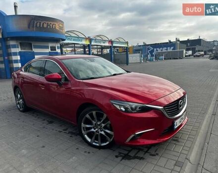 Красный Мазда 6, объемом двигателя 2.49 л и пробегом 87 тыс. км за 13700 $, фото 1 на Automoto.ua