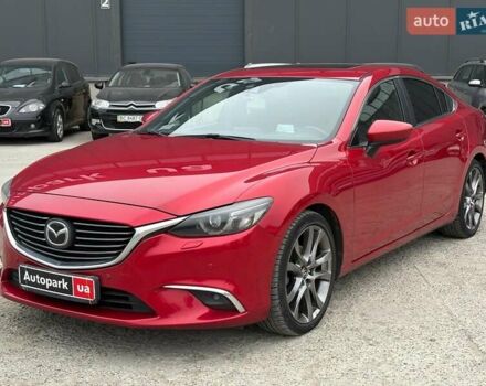 Красный Мазда 6, объемом двигателя 2.5 л и пробегом 270 тыс. км за 12640 $, фото 1 на Automoto.ua