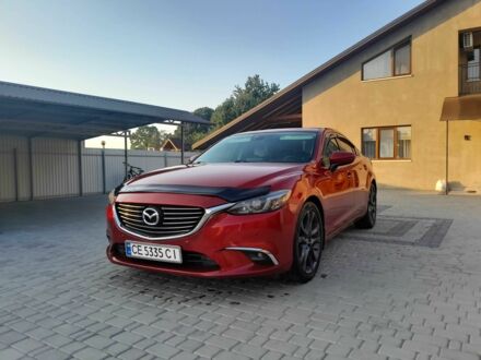 Красный Мазда 6, объемом двигателя 2.5 л и пробегом 256 тыс. км за 12500 $, фото 1 на Automoto.ua