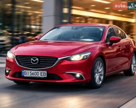 Красный Мазда 6, объемом двигателя 2.49 л и пробегом 230 тыс. км за 13999 $, фото 1 на Automoto.ua