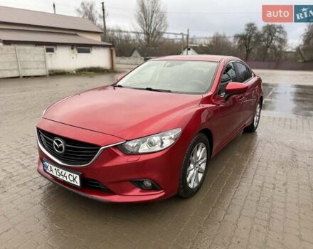 Красный Мазда 6, объемом двигателя 2 л и пробегом 164 тыс. км за 12700 $, фото 1 на Automoto.ua