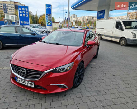 Красный Мазда 6, объемом двигателя 2.49 л и пробегом 320 тыс. км за 12000 $, фото 1 на Automoto.ua