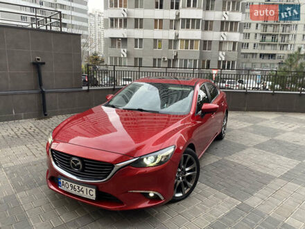 Красный Мазда 6, объемом двигателя 2.49 л и пробегом 131 тыс. км за 16500 $, фото 1 на Automoto.ua