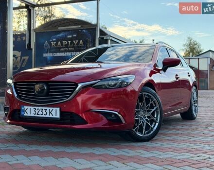 Красный Мазда 6, объемом двигателя 2.2 л и пробегом 117 тыс. км за 17000 $, фото 1 на Automoto.ua