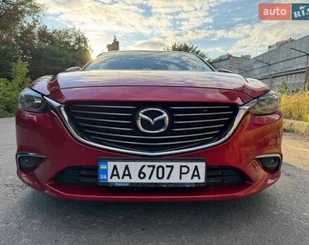 Красный Мазда 6, объемом двигателя 2.19 л и пробегом 175 тыс. км за 15500 $, фото 1 на Automoto.ua