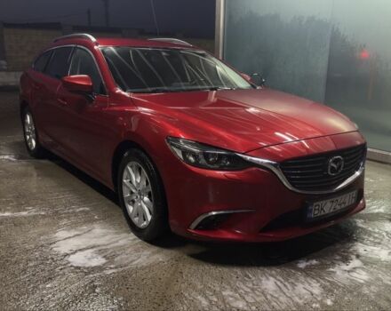 Красный Мазда 6, объемом двигателя 2.2 л и пробегом 176 тыс. км за 13700 $, фото 1 на Automoto.ua