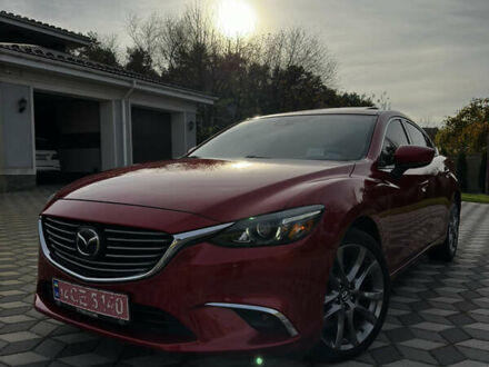 Красный Мазда 6, объемом двигателя 2.5 л и пробегом 107 тыс. км за 15500 $, фото 1 на Automoto.ua