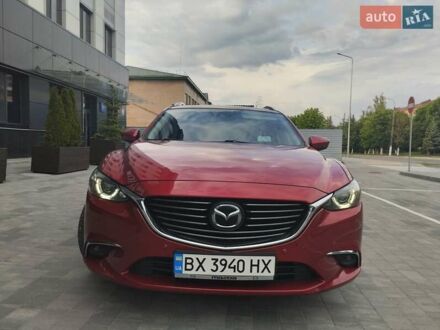 Красный Мазда 6, объемом двигателя 2.19 л и пробегом 229 тыс. км за 13250 $, фото 1 на Automoto.ua