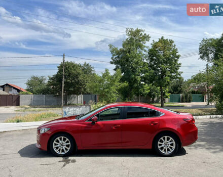 Красный Мазда 6, объемом двигателя 2 л и пробегом 101 тыс. км за 14900 $, фото 1 на Automoto.ua