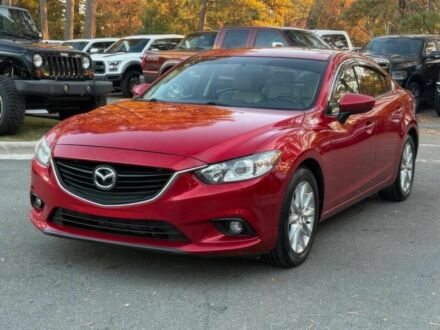 Красный Мазда 6, объемом двигателя 2.5 л и пробегом 74 тыс. км за 10000 $, фото 1 на Automoto.ua