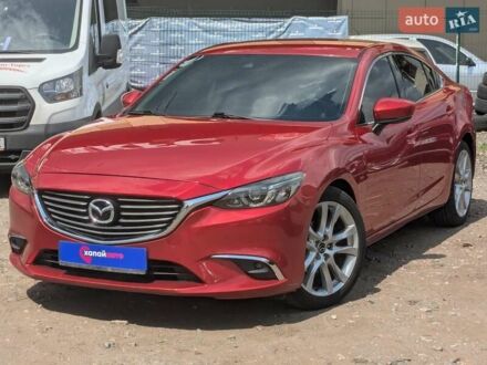 Красный Мазда 6, объемом двигателя 2.49 л и пробегом 115 тыс. км за 12500 $, фото 1 на Automoto.ua