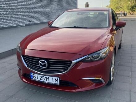 Красный Мазда 6, объемом двигателя 2.5 л и пробегом 190 тыс. км за 9493 $, фото 1 на Automoto.ua