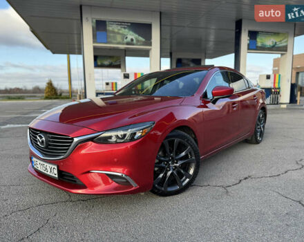 Красный Мазда 6, объемом двигателя 2.49 л и пробегом 145 тыс. км за 13650 $, фото 1 на Automoto.ua