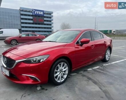 Красный Мазда 6, объемом двигателя 2.19 л и пробегом 94 тыс. км за 16100 $, фото 1 на Automoto.ua
