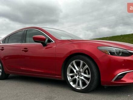 Красный Мазда 6, объемом двигателя 2.49 л и пробегом 142 тыс. км за 14500 $, фото 1 на Automoto.ua