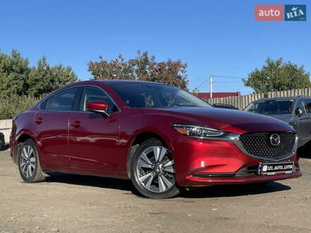 Красный Мазда 6, объемом двигателя 2.49 л и пробегом 136 тыс. км за 10999 $, фото 1 на Automoto.ua