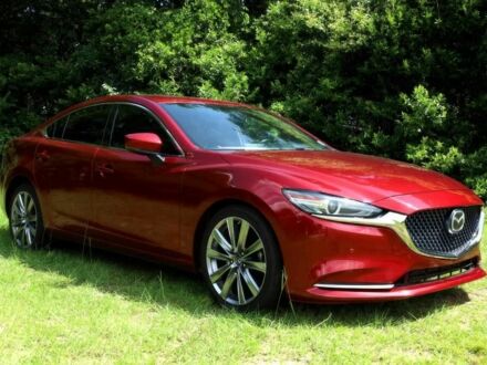 Красный Мазда 6, объемом двигателя 2.5 л и пробегом 59 тыс. км за 7000 $, фото 1 на Automoto.ua
