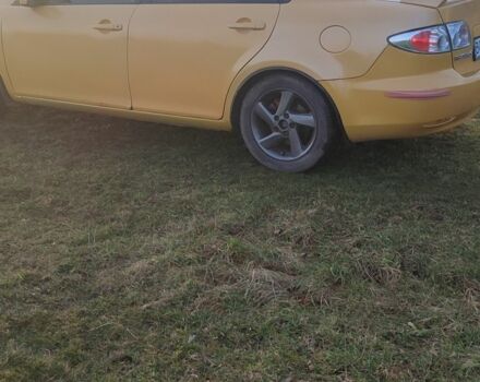 Жовтий Мазда 6, об'ємом двигуна 2 л та пробігом 303 тис. км за 3700 $, фото 2 на Automoto.ua