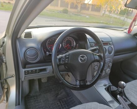 Жовтий Мазда 6, об'ємом двигуна 2 л та пробігом 330 тис. км за 3399 $, фото 18 на Automoto.ua
