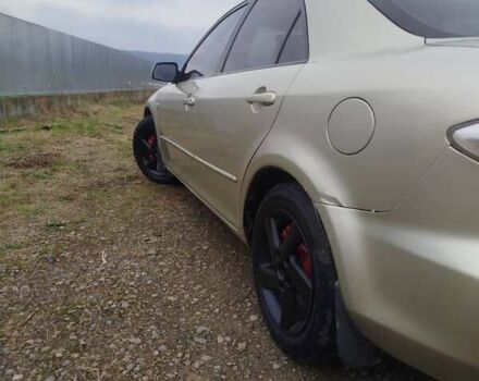 Желтый Мазда 6, объемом двигателя 2 л и пробегом 340 тыс. км за 3600 $, фото 5 на Automoto.ua