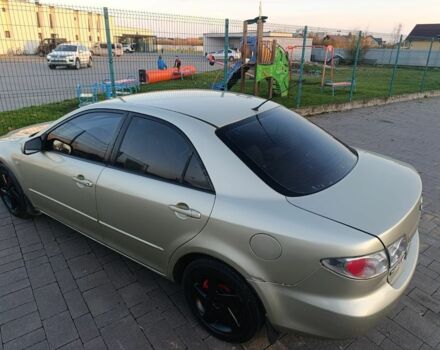 Жовтий Мазда 6, об'ємом двигуна 2 л та пробігом 330 тис. км за 3399 $, фото 6 на Automoto.ua