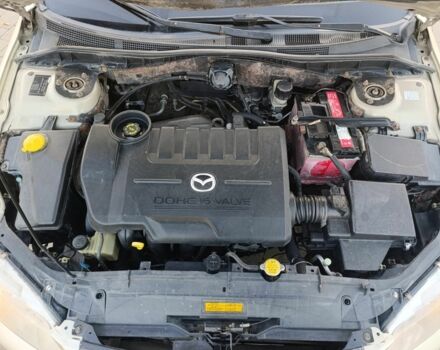 Жовтий Мазда 6, об'ємом двигуна 2 л та пробігом 330 тис. км за 3399 $, фото 22 на Automoto.ua