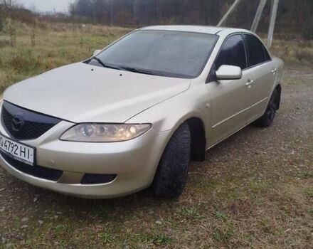 Желтый Мазда 6, объемом двигателя 2 л и пробегом 340 тыс. км за 3600 $, фото 3 на Automoto.ua