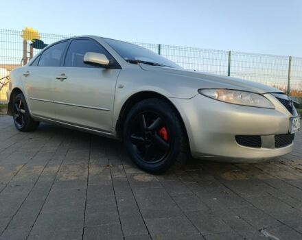 Жовтий Мазда 6, об'ємом двигуна 2 л та пробігом 330 тис. км за 3399 $, фото 4 на Automoto.ua