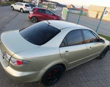 Жовтий Мазда 6, об'ємом двигуна 2 л та пробігом 330 тис. км за 3399 $, фото 7 на Automoto.ua