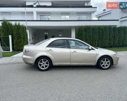 Желтый Мазда 6, объемом двигателя 1.99 л и пробегом 284 тыс. км за 4400 $, фото 4 на Automoto.ua