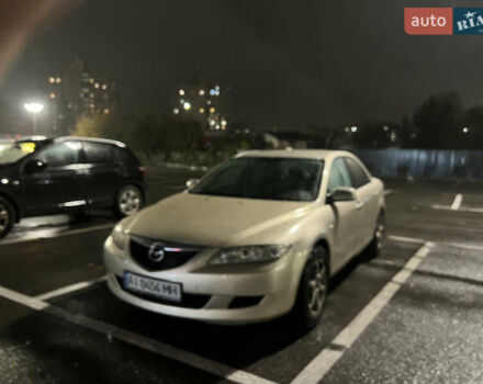 Желтый Мазда 6, объемом двигателя 1.99 л и пробегом 284 тыс. км за 4400 $, фото 2 на Automoto.ua