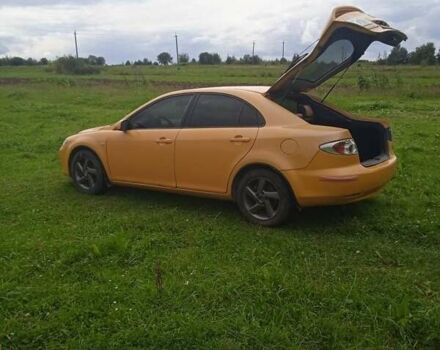 Желтый Мазда 6, объемом двигателя 2 л и пробегом 133 тыс. км за 3700 $, фото 2 на Automoto.ua