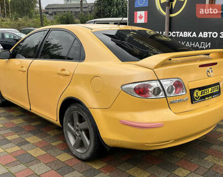 Жовтий Мазда 6, об'ємом двигуна 2 л та пробігом 303 тис. км за 3999 $, фото 3 на Automoto.ua